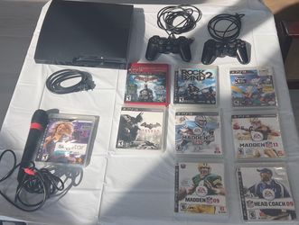 Sony PS3 Slim 160GB Bundle - 2 Controllers + 8 Games