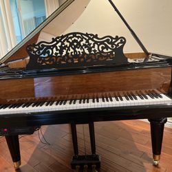 Story and Clark. baby grand player piano