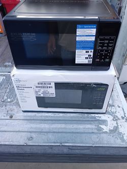 Microwave oven practically brand new in the box no offers no trade 75th Ave Indian School serious buyers only please $25 cash takes it cheap