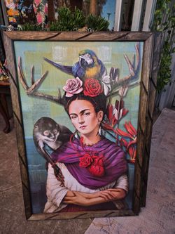 Decorative canvas print titled "Hommage à Frida"
