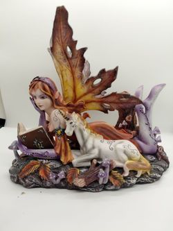 Faerie with unicorn