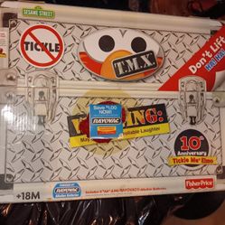 Fisher Price Tickle Me Elmo TMX Doll