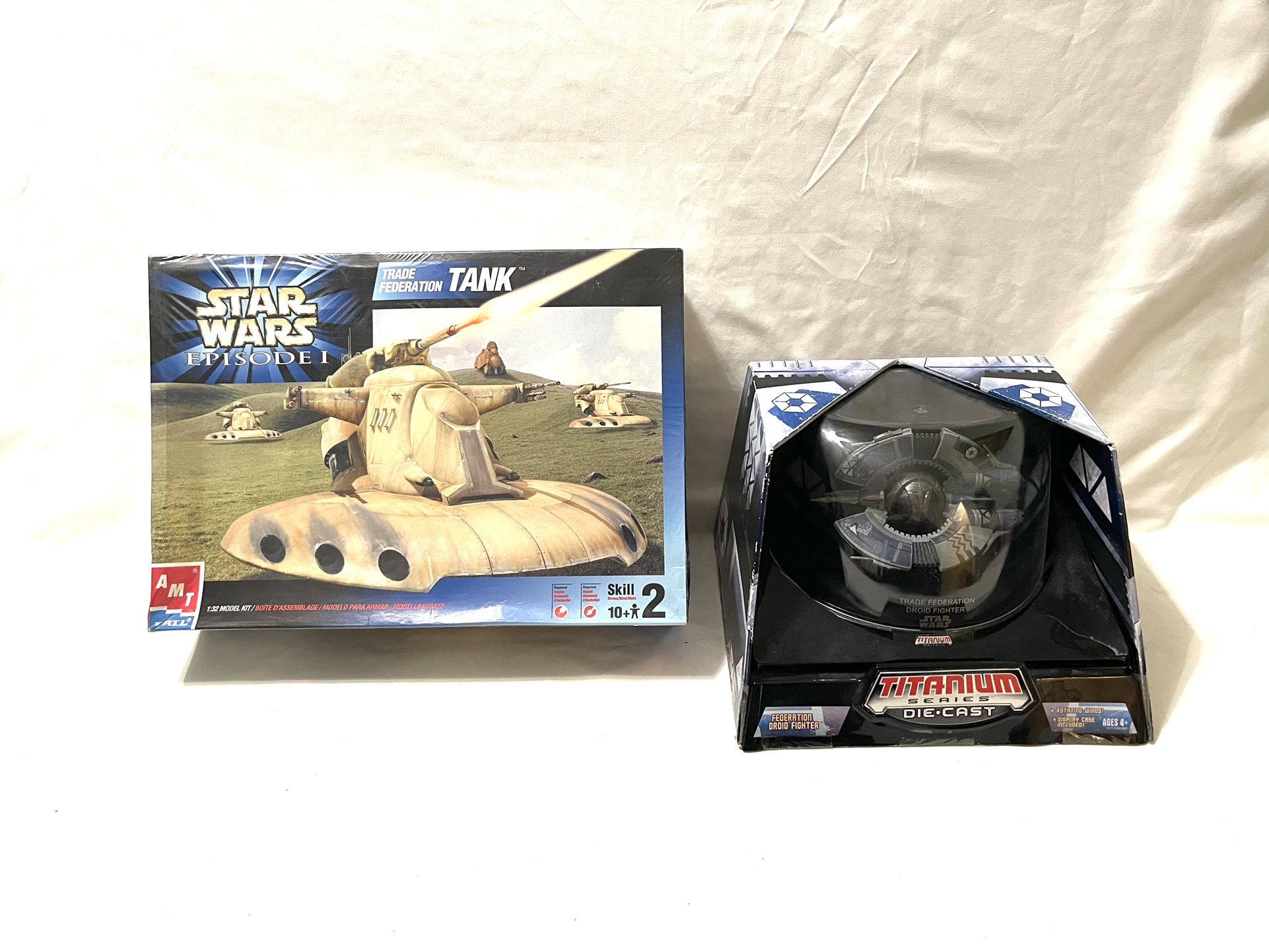 Vintage New In Boxes Star Wars Diecast Droid Fighter & Star Wars Federation Model Tank. The retail for $85 for both.