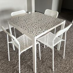 Dinning table with four chairs