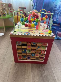 Wooden activity cube