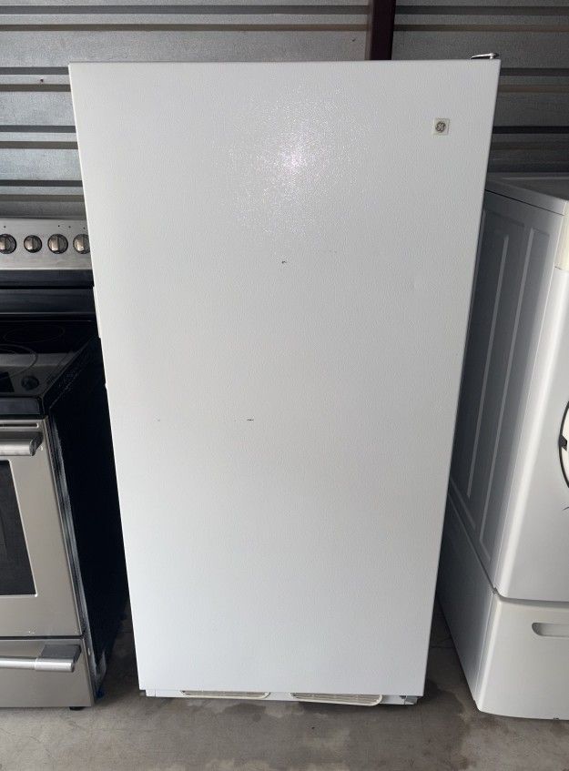 White GE Standing Freezer