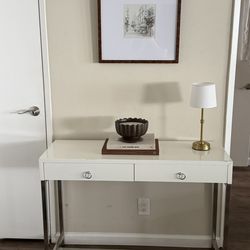 Modern white lacquer vanity / console table with chrome legs and ring-pull drawers