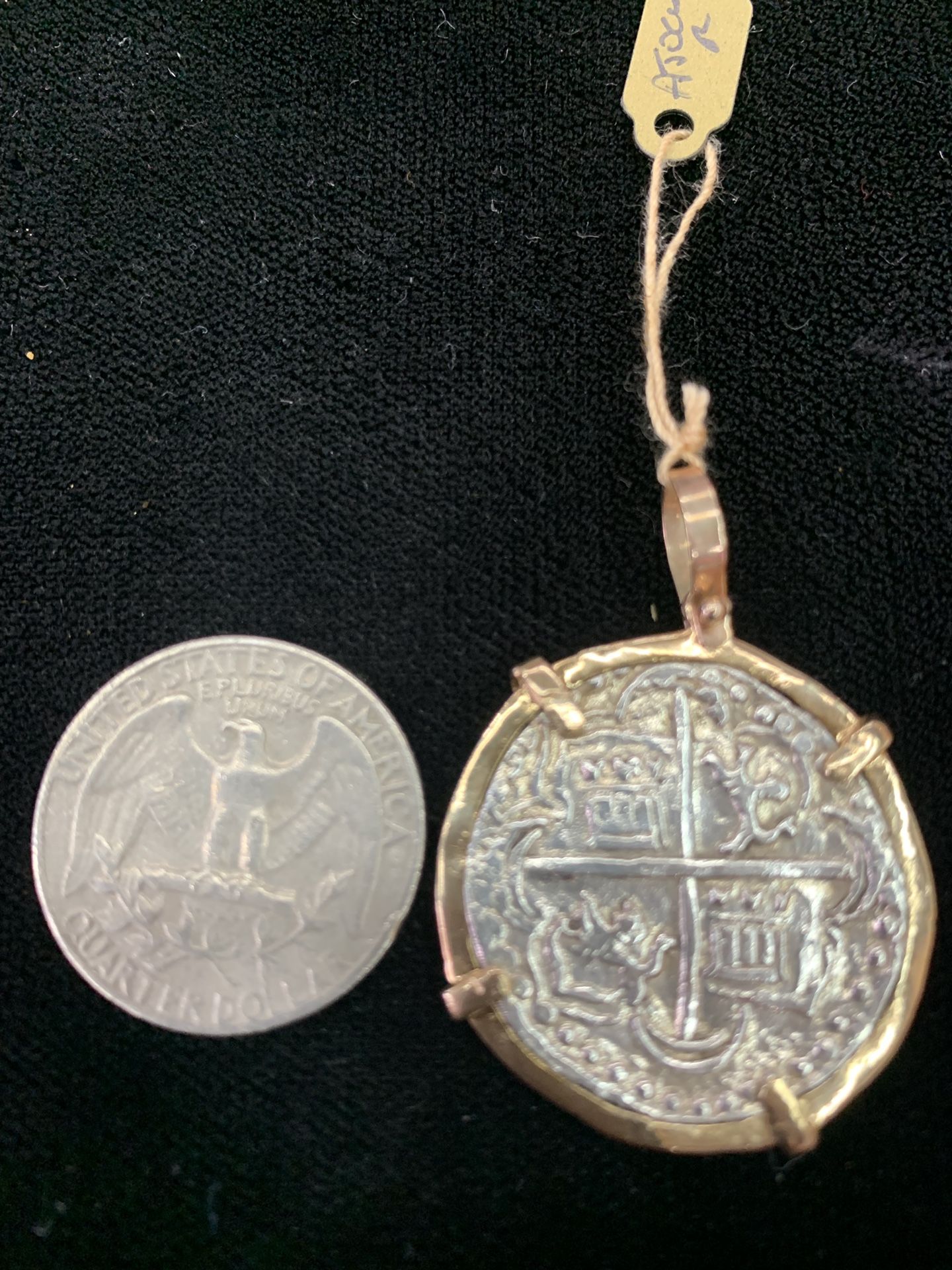 Atocha silver coin pendant in gold bezel