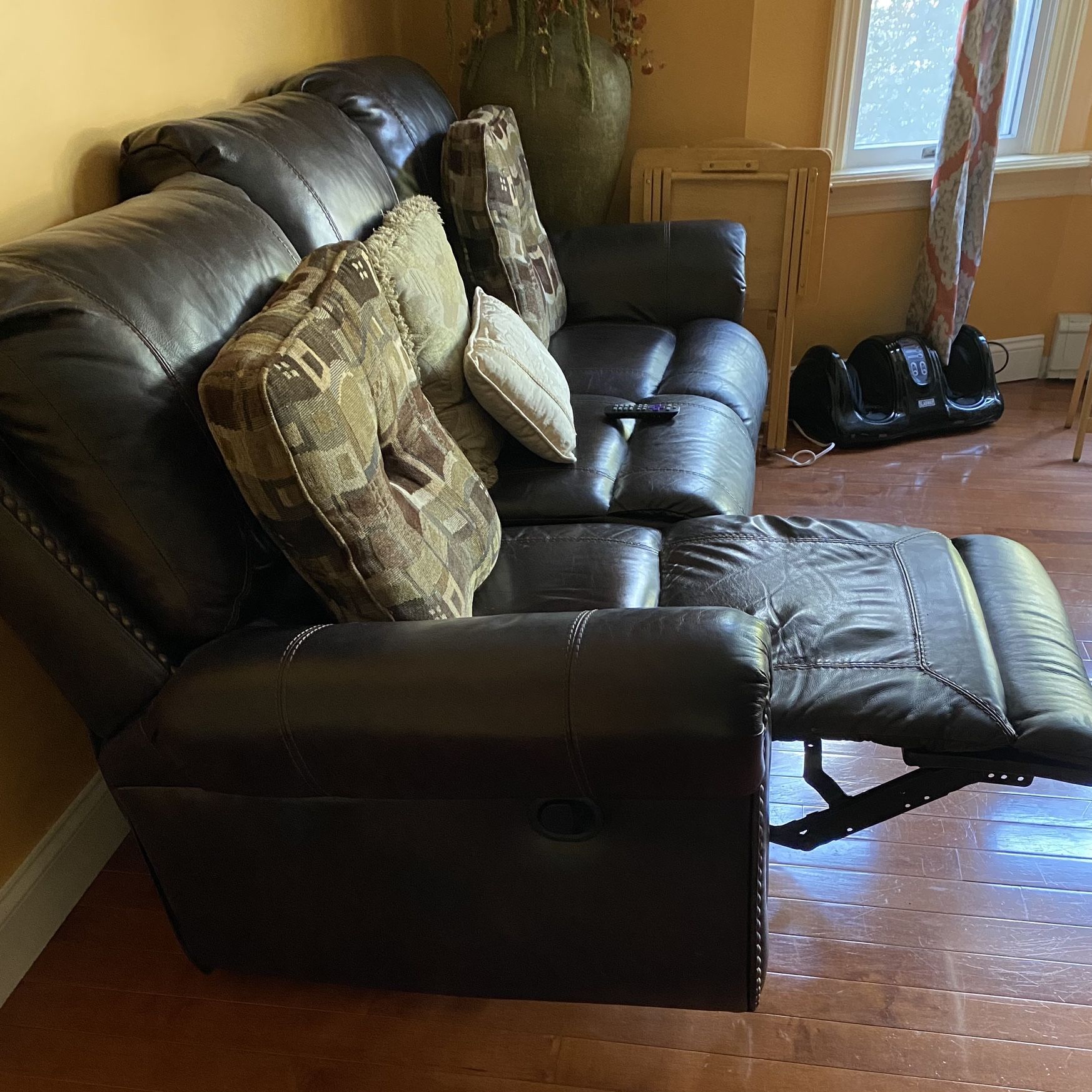 Leather recliner with nailheads