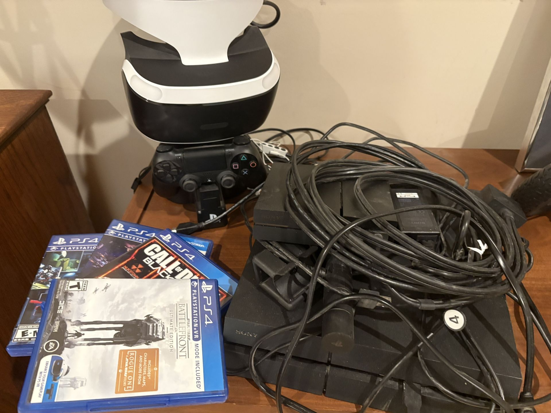 PS4 + VR Headset And Games
