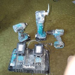 Makita Makita 2-port Multi Chargerger,Four 18 Volt Makita Lithium Batteries Makita's Multi-Tool, Impact,Drill