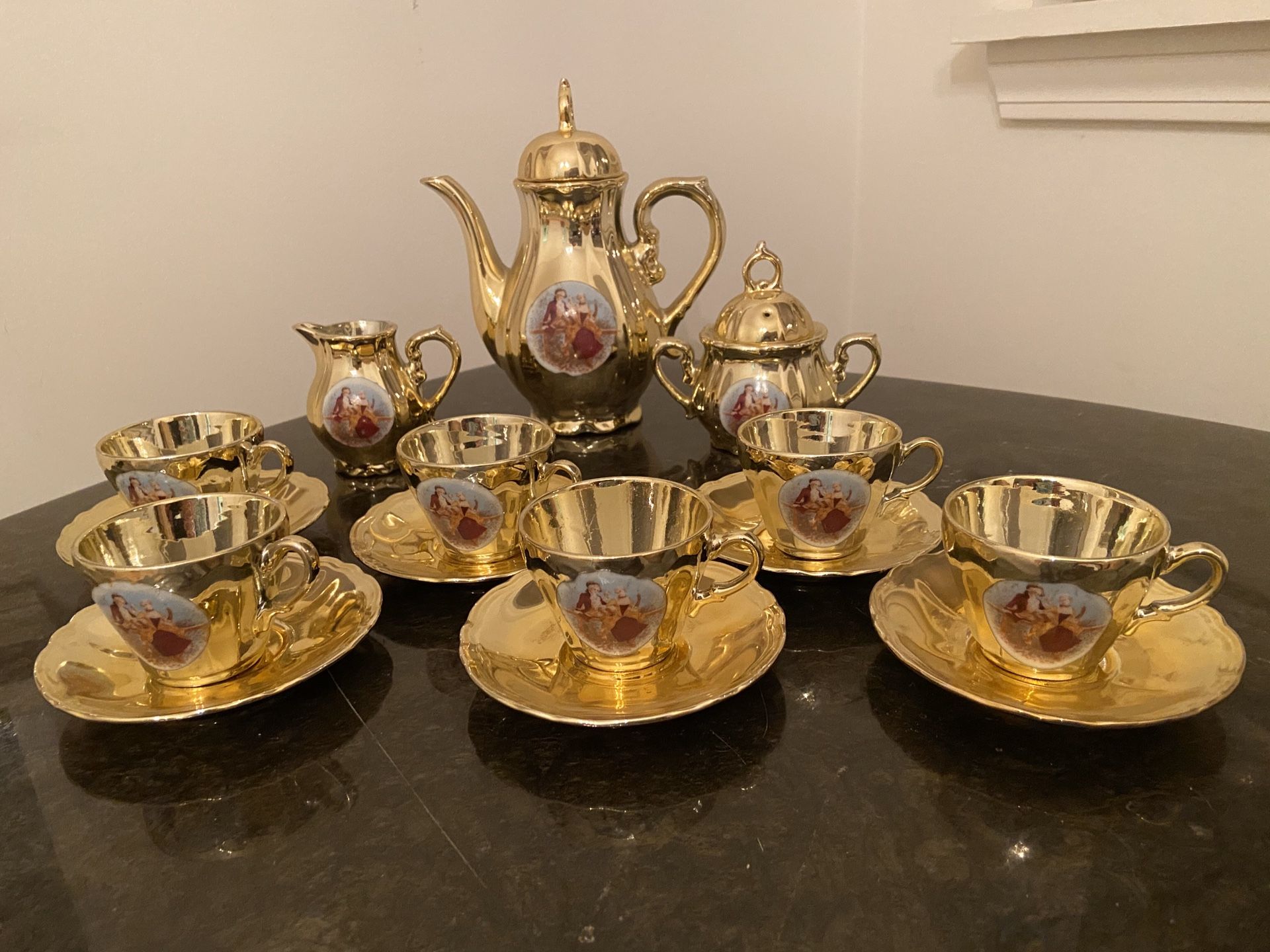 European porcelain Gold plated “ Madonna” coffee set for 6 persons