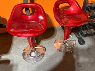 2 red bar stools