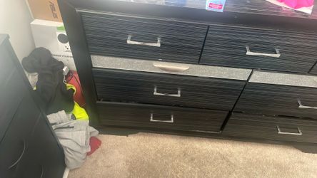 Black and silver woman’s dresser.