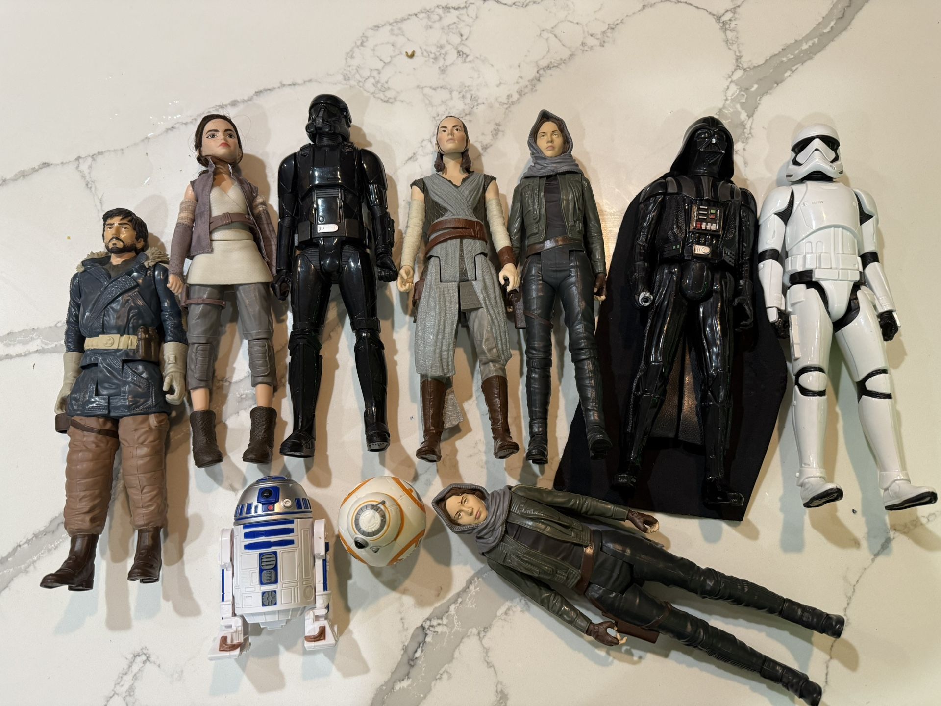 collection of Star Wars action figurines 12” Tall