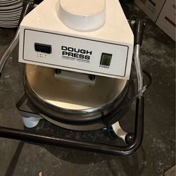 Pizza dough press