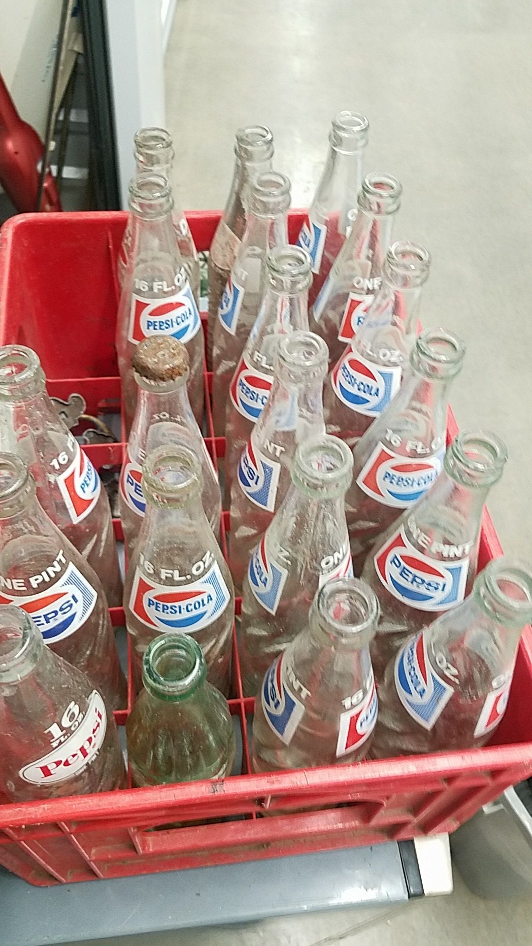 Antique Pepsi and Double Cola pop bottles