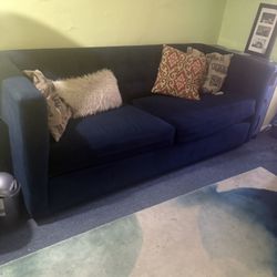 West Elm’s velvet, grid-tufted sleeper style