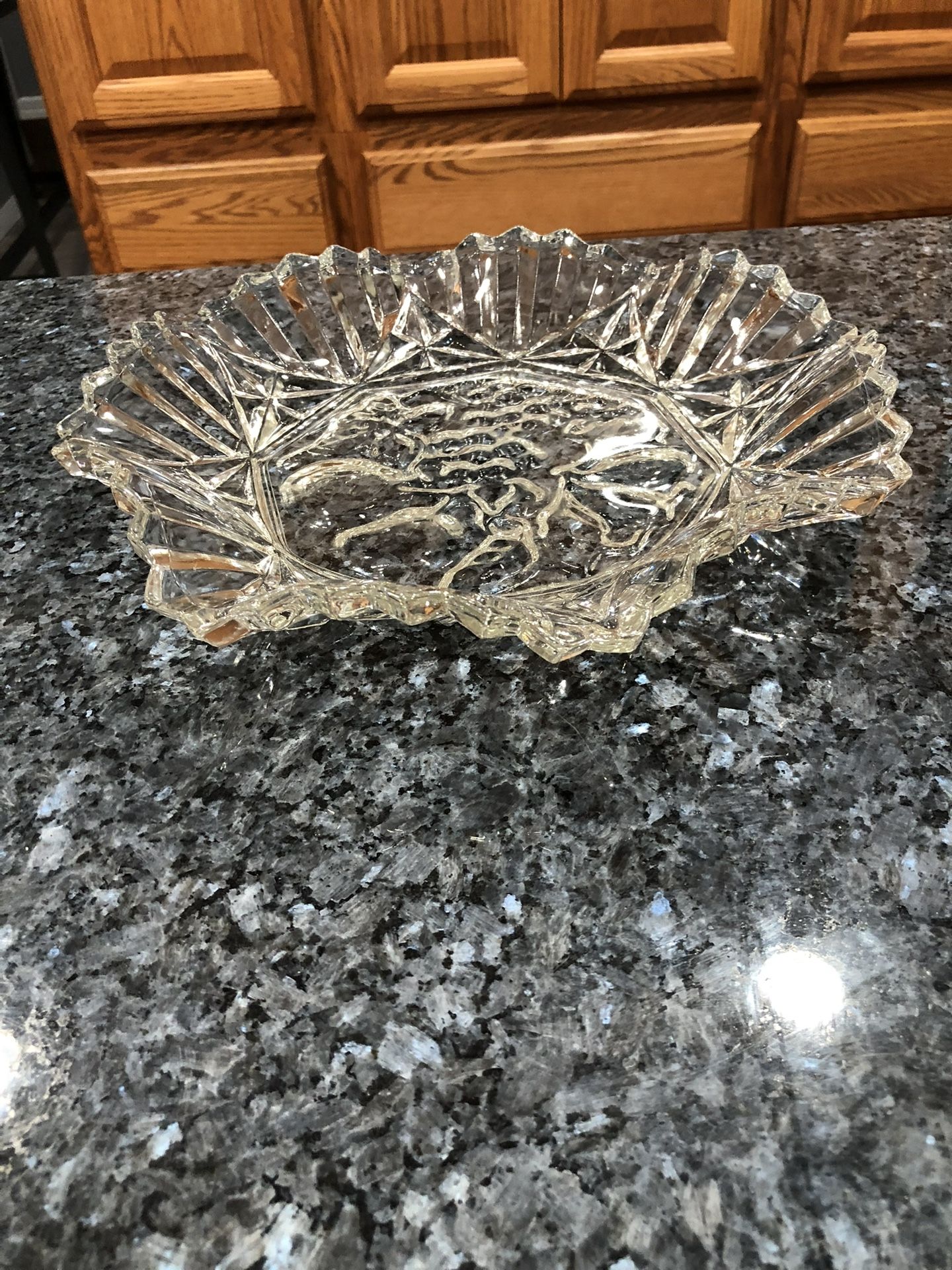 Vintage 11 inch wide Federal Think Glass Pioneer Intaglio With A Ruffle Edge Bowl.  The pattern in the center is fruit.  Preowned Excellent Condition