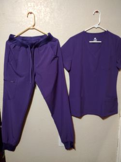 BRAND NEW.... Purple scrub set