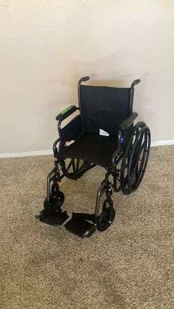 Wheelchair New with Adjustable Footrests