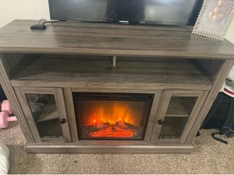 Tv stand with fireplace