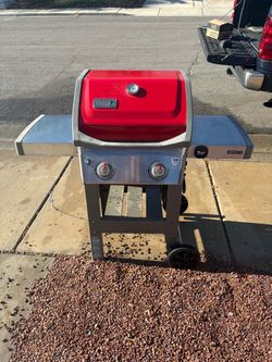 Weber spirit 11 propane BBQ grill with rotisserie.