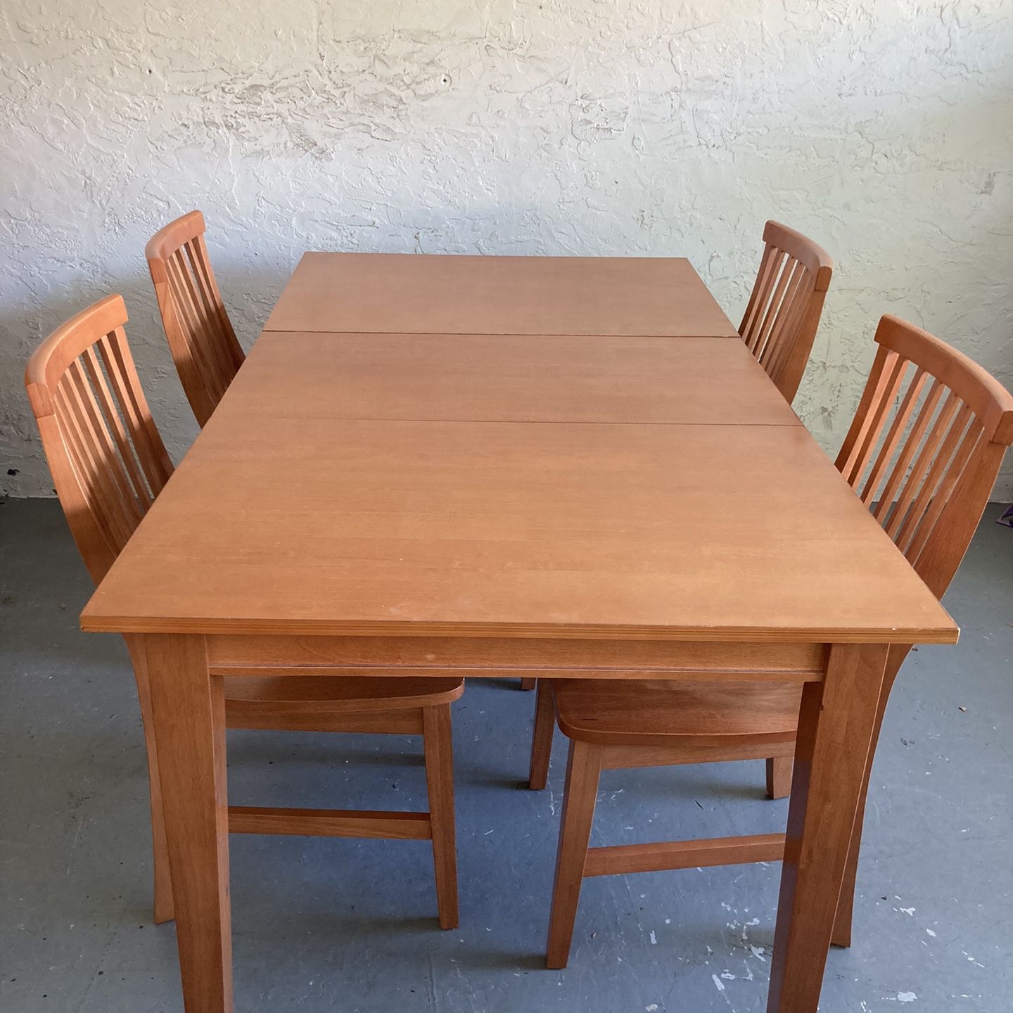 Wooden dining table with extension and 4 chairs