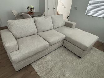 Light gray sectional sofa