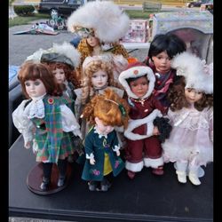 9 Porcelain Dolls