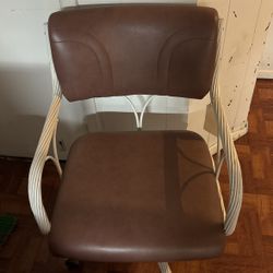 Brown And White Swivel Chair 