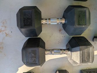 50 lb dumbbells and 45 lb dumbbells.