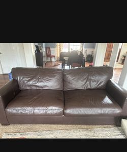 Crate and barrel pull out couch brown leather