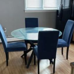 Modern Glass Table with Blue Chairs