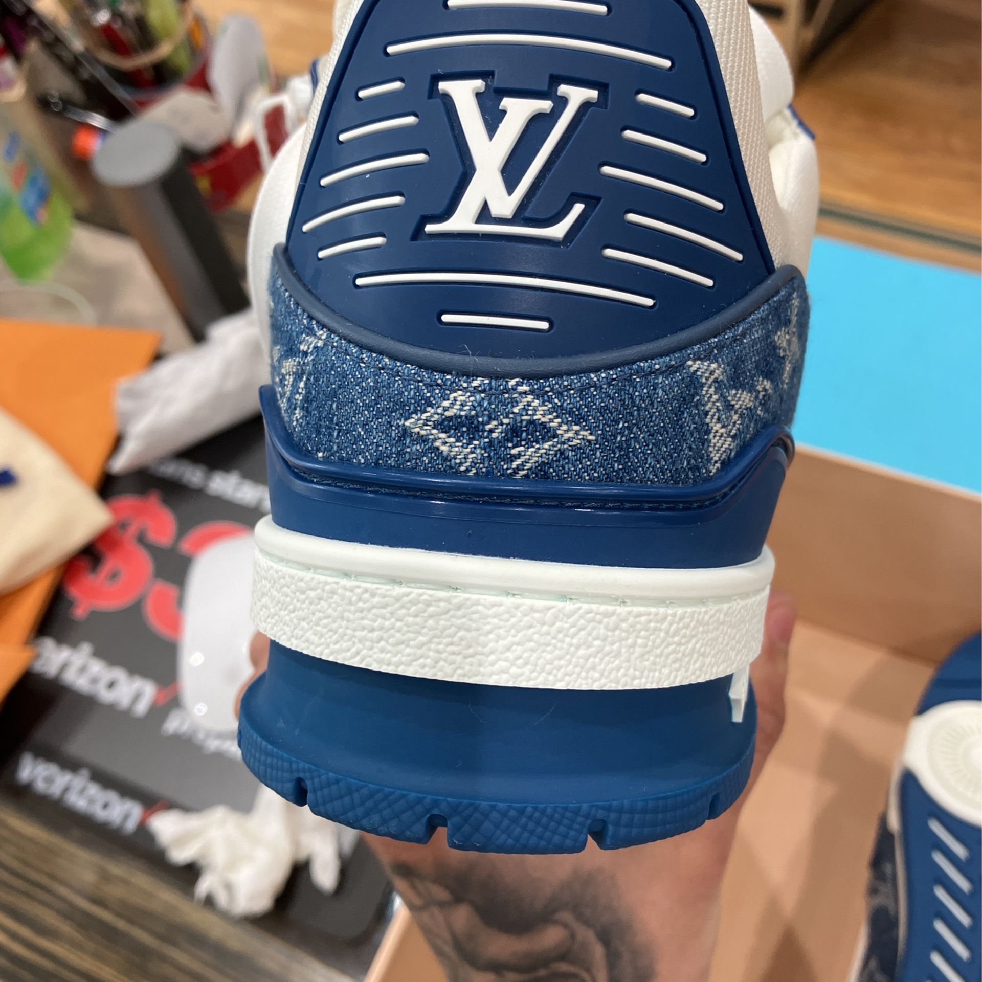 Where to buy LV trainer sneakers in denim blue monogram? Price and