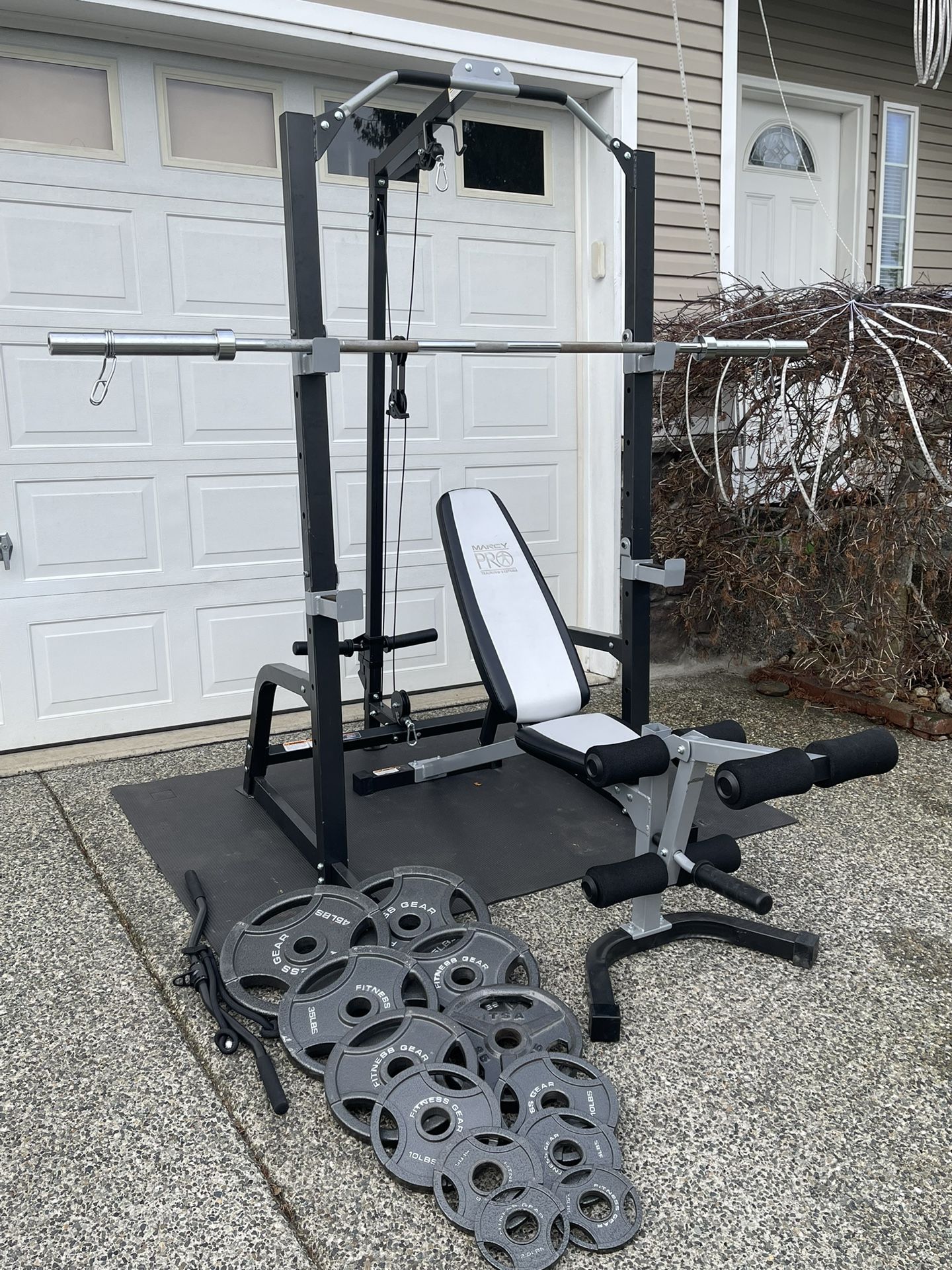 squat rack with last pull down,weight and bench