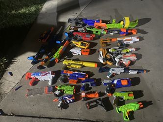Nerf Guns Mag Scopes And A Water Gun