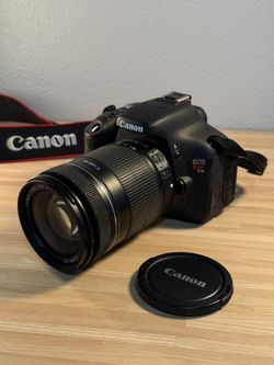 Canon EOS Rebel T3i SLR Camera with Canon Zoom lens 18-135 mm and brand new batteries