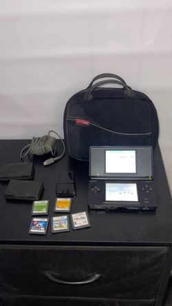 Nintendo DS Lite Blue Bundle – 5 Games, Charger & Carrying Case