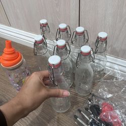 8 Glass Bottles For Sauces Or Syrups. With Funel And Pooring Beeks. Good For Oils, Flavored Syrups, Special Salsas Etc. Take All For Price Listed 