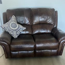 Haverty’s top-grain Leather Reclining love seat
