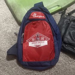 Angels Kids Club branded sling backpack with a Chick-fil-A logo.