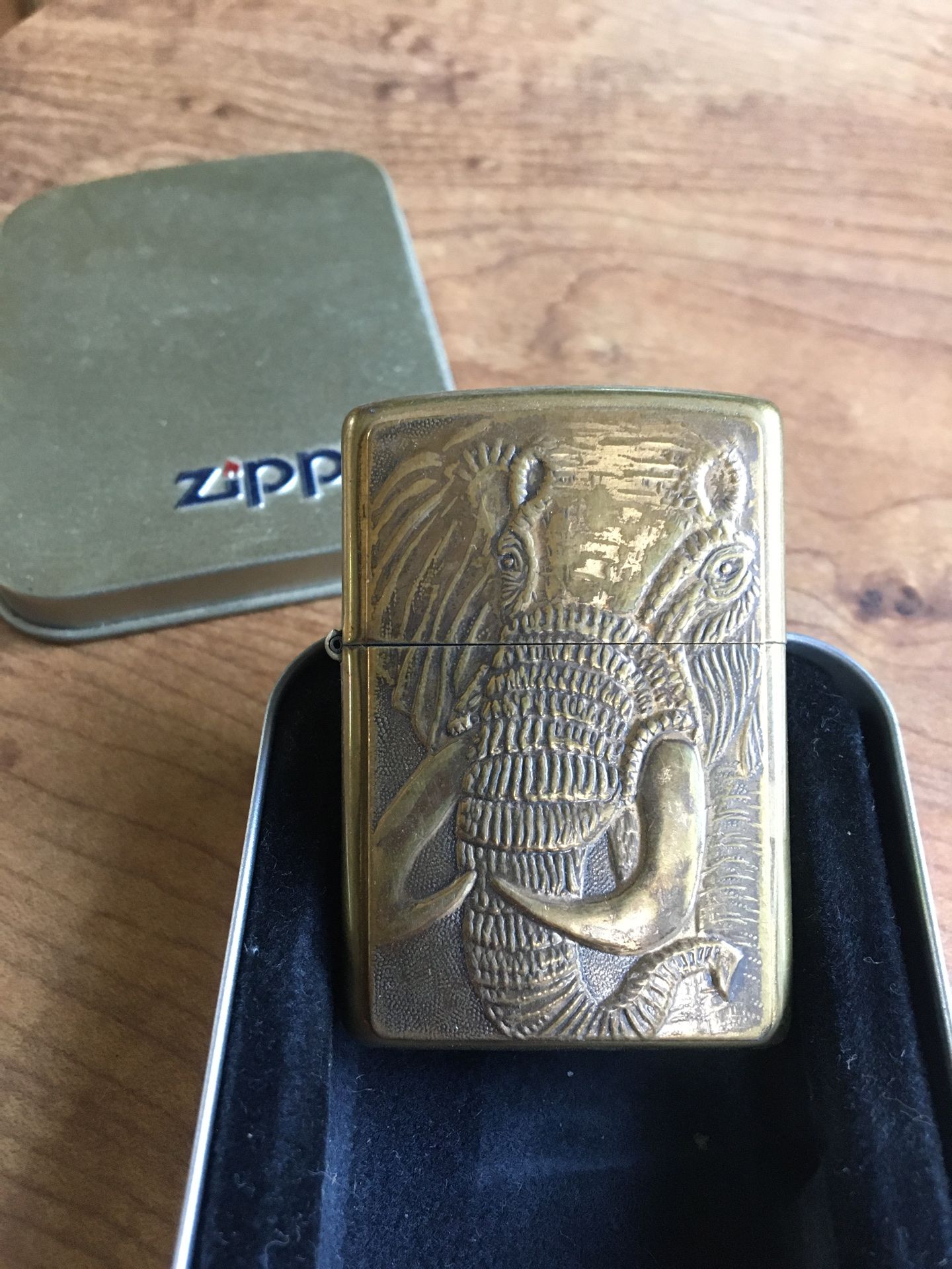 Collectible elephant zippo gold great condition