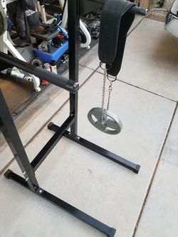 Titan fitness DIP stand DIP belt and 25lb plate for Sale in Tucson