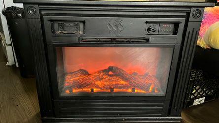 Electric fireplace heat surge