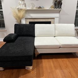 Black & white XL sofa with chaise lounge. Suede. BRANDNEW out of the box. Assembked.  83”Wx 31”D. 