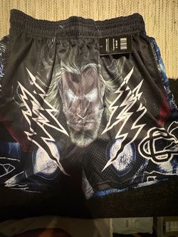 XL Corruptive Creative Thor shorts with graphic of a man's face with lightning bolts, size XL #thor #marvel