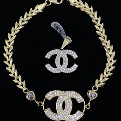 $1100 Yellow Gold W Zirconia Chanel Bracelet And Charm Set