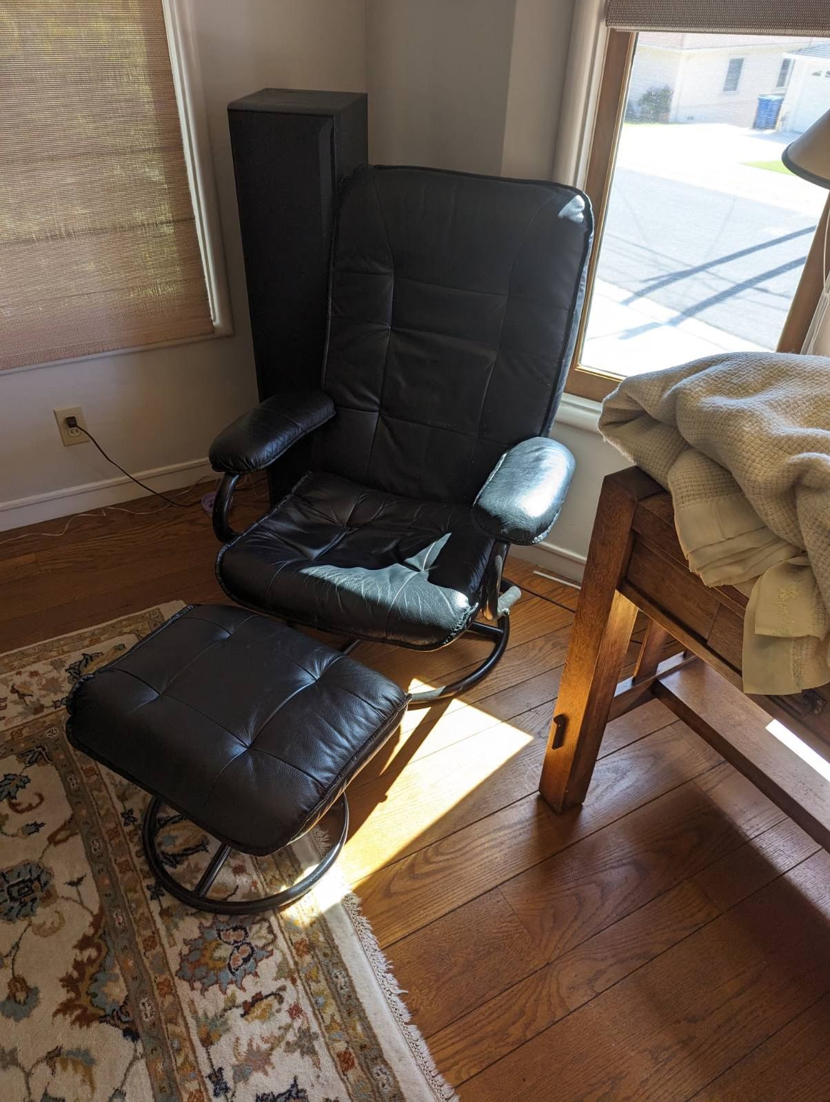 Comfortable Black Faux Leather Chair And Ottoman