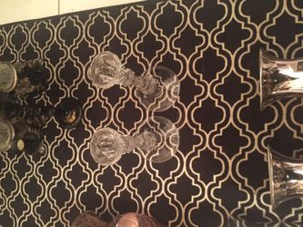 Two glass candle holders